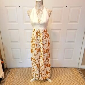 NWT‎ Follow Me white halter printed wide leg bottom backless jumpsuit w/ pockets